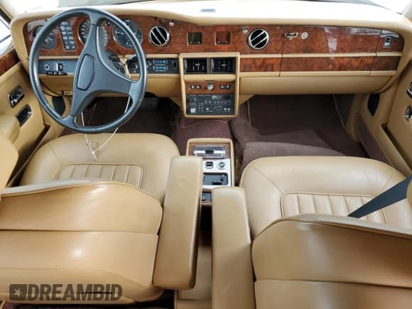 ✅ 1988 Rolls-Royce Silver Spirit • VIN: SCAZS02B0JCX21815 • Лот: 71994015. Опубликован ранее на Copart с пробегом 11 633 миль. Бесплатный доступ к архиву аукционных продаж из США и подробный отчёт об истории автомобиля на DreamBid. Изображение 8.