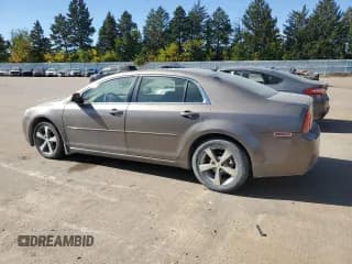 ✅ 2011 Chevrolet Malibu 1LT • VIN: 1G1ZC5E15BF114341 • Lot: 75887574. Listed on Copart with 102,693 mi. Free auction sales archive from the USA and detailed vehicle history report at DreamBid. Image 2.
