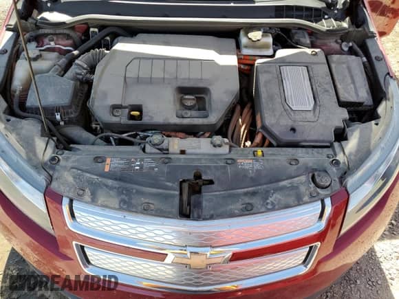 2015 Chevrolet Volt z VIN 1G1RD6E47FU137134, wystawiony jako Copart lot #59706684 z przebiegiem 98 532 mil mil oraz Szkoda całkowita • Salvage title. Historia ofert i sprzedaży dostępna na DreamBid. Obrazek 11.