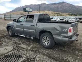 ✅ 2006 Mitsubishi Raider Duro Cross • VIN: 1Z7HT38N76S560515 • Lot: 82208515. Wystawiony na Copart z przebiegiem 176 987 mil. Bezpłatny archiwum sprzedaży aukcyjnych z USA i szczegółowy raport historii pojazdu na DreamBid. Zdjęcie 2.