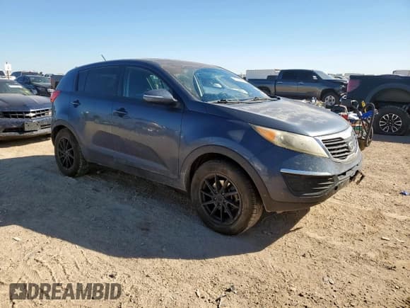 ✅ 2012 Kia Sportage LX • VIN: KNDPB3A21C7198464 • Lot: 81725085. Wystawiony na Copart z przebiegiem 167 664 mil. Bezpłatny archiwum sprzedaży aukcyjnych z USA i szczegółowy raport historii pojazdu na DreamBid. Zdjęcie 4.