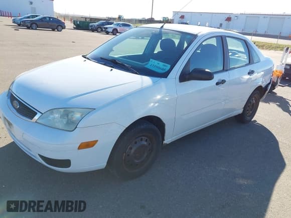 ✅ 2007 Ford Focus S • VIN: 1FAFP34NX7W308254 • Lot: 43590605. Listed on IAAI with 154,344 mi. Free auction sales archive from the USA and detailed vehicle history report at DreamBid. Image 17.