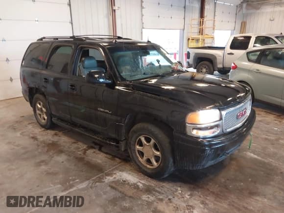 ✅ 2003 GMC Yukon Denali • VIN: 1GKEK63U73J314961 • Lot: 43286078. Listed on IAAI with 227,064 mi. Free auction sales archive from the USA and detailed vehicle history report at DreamBid. Image 1.