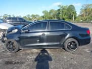 ✅ 2011 Volkswagen Jetta SEL • VIN: 3VWLX7AJ4BM335798 • Lot: 41664073. Listed on IAAI with 209,080 mi. Free auction sales archive from the USA and detailed vehicle history report at DreamBid. Image 14.