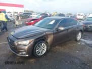 ✅ 2014 Infiniti Q50 Premium • VIN: JN1BV7AP5EM673500 • Lot: 43550028. Listed on IAAI with 139,057 mi. Free auction sales archive from the USA and detailed vehicle history report at DreamBid. Image 18.