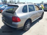 ✅ 2005 Porsche Cayenne • VIN: WP1AA29P55LA24408 • Лот: 42398234. Опубликован ранее на IAAI с пробегом 237 890 миль. Бесплатный доступ к архиву аукционных продаж из США и подробный отчёт об истории автомобиля на DreamBid. Изображение 4.