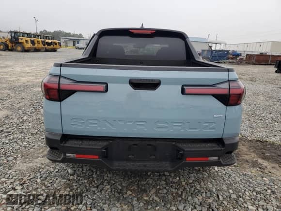 2024 Hyundai Santa Cruz SEL z VIN 5NTJBDDE3RH101529, wystawiony jako Copart lot #79864154 z przebiegiem 2 272 mil mil oraz Szkoda całkowita • Salvage title. Historia ofert i sprzedaży dostępna na DreamBid. Obrazek 6.