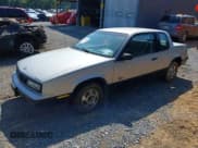 ✅ 1987 Oldsmobile Calais • VIN: 1G3NF14L6HM279358 • Lot: 42526934. Listed on IAAI with 115,666 mi. Free auction sales archive from the USA and detailed vehicle history report at DreamBid. Image 2.