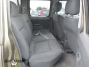 ✅ 2002 Nissan Frontier XE • VIN: 1N6ED27T72C391796 • Lot: 43758517. Listed on IAAI with 122,559 mi. Free auction sales archive from the USA and detailed vehicle history report at DreamBid. Image 8.