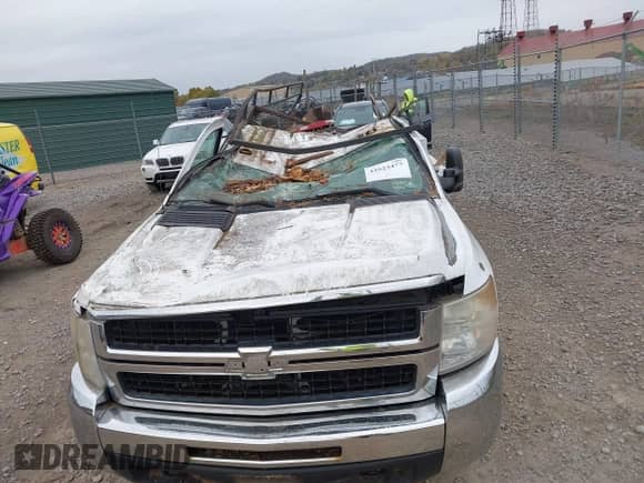 2009 Chevrolet Silverado 2500HD Work Truck z VIN 1GCHK44K69E163090, wystawiony jako IAAI lot #43523477 z przebiegiem 69 802 mil mil oraz . Historia ofert i sprzedaży dostępna na DreamBid. Obrazek 6.