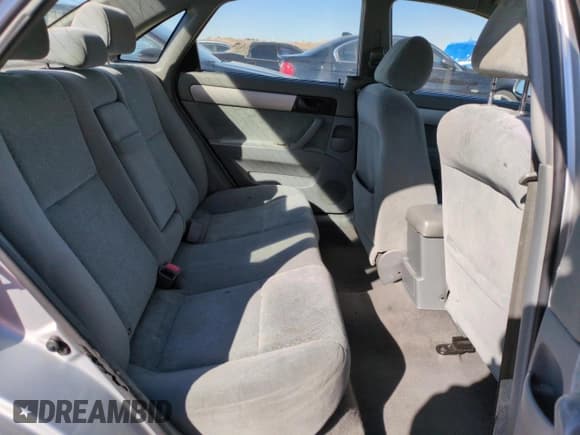 ✅ 2005 Suzuki Forenza S • VIN: KL5JD56Z45K144227 • Lot: 46600015. Listed on Copart with 163,677 mi. Free auction sales archive from the USA and detailed vehicle history report at DreamBid. Image 10.