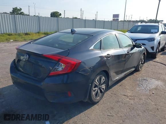 ✅ 2018 Honda Civic EX-L • VIN: JHMFC1F7XJX040301 • Lot: 43151124. Listed on IAAI with 135,190 mi. Free auction sales archive from the USA and detailed vehicle history report at DreamBid. Image 4.