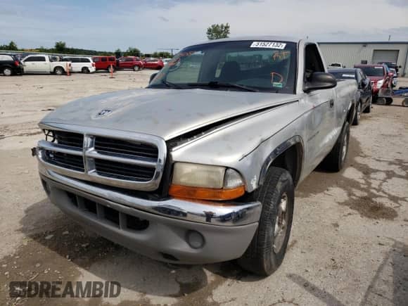 2001 Dodge Dakota with VIN 1B7GG26X01S194089, listed as a Copart auction lot 51527132 with 198,011 mi miles and Salvage title. Bid and sale history available at DreamBid. Image 2.