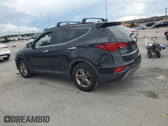 ✅ 2017 Hyundai Santa Fe 2.4L • VIN: 5XYZU3LB1HG450644 • Лот: 69337864. Опубликован ранее на Copart с пробегом 91 483 миль. Бесплатный доступ к архиву аукционных продаж из США и подробный отчёт об истории автомобиля на DreamBid. Изображение 2.