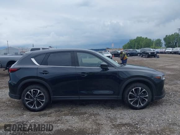✅ 2023 Mazda CX-5 S Premium Plus • VIN: JM3KFBEM9P0125871 • Лот: 43088388. Опубликован ранее на IAAI с пробегом 31 690 миль. Бесплатный доступ к архиву аукционных продаж из США и подробный отчёт об истории автомобиля на DreamBid. Изображение 13.