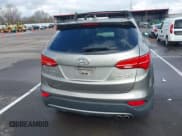 ✅ 2016 Hyundai Santa Fe • VIN: 5XYZW4LA3GG315347 • Lot: 43732067. Listed on IAAI with 79,895 mi. Free auction sales archive from the USA and detailed vehicle history report at DreamBid. Image 16.