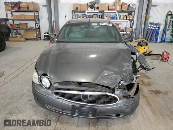 ✅ 2005 Buick LaCrosse CXL • VIN: 2G4WD562851274512 • Lot: 71148225. Wystawiony na Copart z przebiegiem 202 947 mil. Bezpłatny archiwum sprzedaży aukcyjnych z USA i szczegółowy raport historii pojazdu na DreamBid. Zdjęcie 5.