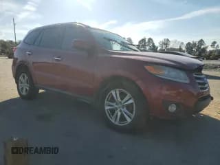 ✅ 2012 Hyundai Santa Fe Limited • VIN: 5XYZK3AB9CG131428 • Lot: 77368904. Listed on Copart with 147,406 mi. Free auction sales archive from the USA and detailed vehicle history report at DreamBid. Image 4.