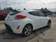 2013 Hyundai Veloster w/Gray Int с VIN KMHTC6AD0DU167414, выставлен на аукционе Copart как лот 73476894 с пробегом 119 928 миль миль и Списание • Salvage title. История ставок и продаж доступна на DreamBid. Изображение 3.
