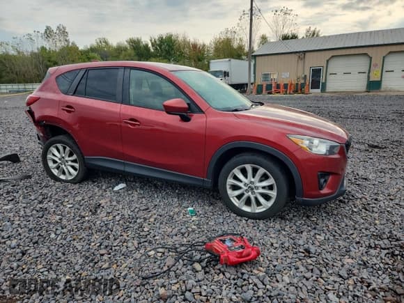 ✅ 2013 Mazda CX-5 Grand Touring • VIN: JM3KE4DE2D0165844 • Лот: 81714795. Опубликован ранее на Copart с пробегом 210 416 миль. Бесплатный доступ к архиву аукционных продаж из США и подробный отчёт об истории автомобиля на DreamBid. Изображение 4.