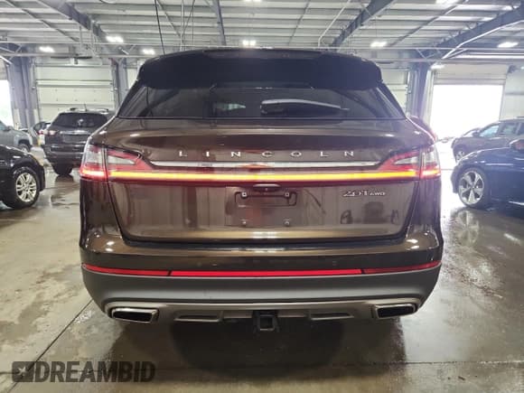 ✅ 2019 Lincoln Nautilus Reserve • VIN: 2LMPJ8L97KBL25122 • Лот: 67236405. Опубликован ранее на Copart с пробегом 74 654 миль. Бесплатный доступ к архиву аукционных продаж из США и подробный отчёт об истории автомобиля на DreamBid. Изображение 6.