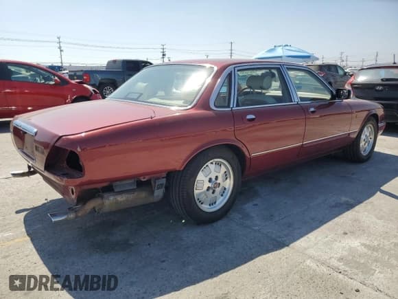 ✅ 1995 Jaguar XJ • VIN: SAJKX1744SC720830 • Lot: 69212295. Listed on Copart with 77,847 mi. Free auction sales archive from the USA and detailed vehicle history report at DreamBid. Image 3.
