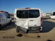 ✅ 2020 Ford Transit Passenger XL • VIN: 1FBAX2Y86LKA24158 • Lot: 84503734. Listed on Copart with 142,051 mi. Free auction sales archive from the USA and detailed vehicle history report at DreamBid. Image 6.