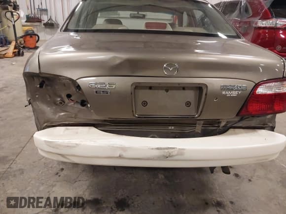 ✅ 2000 Mazda 626 LX • VIN: 1YVGF22C5Y5122894 • Lot: 42183386. Listed on IAAI with 154,888 mi. Free auction sales archive from the USA and detailed vehicle history report at DreamBid. Image 18.