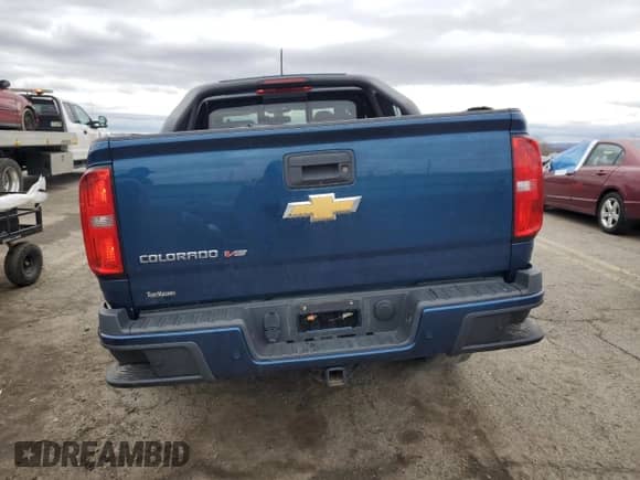 2020 Chevrolet Colorado 4WD Z71 с VIN 1GCHTDEN7L1140874, выставлен на аукционе Copart как лот 49162725 с пробегом 38 875 миль миль и Списание • Salvage title. История ставок и продаж доступна на DreamBid. Изображение 6.