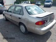 ✅ 1999 Toyota Corolla VE • VIN: 1NXBR12E6XZ251505 • Lot: 42480435. Listed on IAAI with 178,568 mi. Free auction sales archive from the USA and detailed vehicle history report at DreamBid. Image 3.