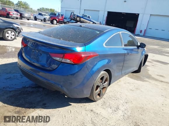 ✅ 2014 Hyundai Elantra • VIN: KMHDH6AH6EU028852 • Lot: 43632869. Listed on IAAI with 120,468 mi. Free auction sales archive from the USA and detailed vehicle history report at DreamBid. Image 4.