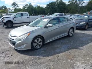 ✅ 2012 Hyundai Sonata Hybrid • VIN: KMHEC4A46CA062146 • Лот: 43448525. Опубликован ранее на IAAI с пробегом 184 686 миль. Бесплатный доступ к архиву аукционных продаж из США и подробный отчёт об истории автомобиля на DreamBid. Изображение 2.