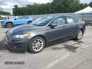 ✅ 2020 Ford Fusion SE • VIN: 3FA6P0H71LR210236 • Lot: 71119955. Listed on Copart with 102,806 mi. Free auction sales archive from the USA and detailed vehicle history report at DreamBid. Image 1.