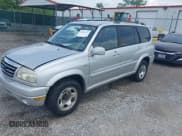 ✅ 2002 Suzuki XL7 Standard • VIN: JS3TX92V624124535 • Lot: 42522274. Listed on IAAI with 180,814 mi. Free auction sales archive from the USA and detailed vehicle history report at DreamBid. Image 2.