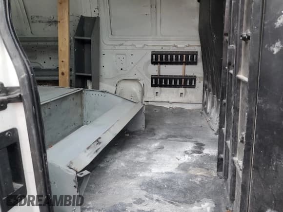 ✅ 2010 Ford Econoline Cargo Commercial • VIN: 1FTNE1EW9ADA22017 • Lot: 67210365. Wystawiony na Copart z przebiegiem 79 746 mil. Bezpłatny archiwum sprzedaży aukcyjnych z USA i szczegółowy raport historii pojazdu na DreamBid. Zdjęcie 11.