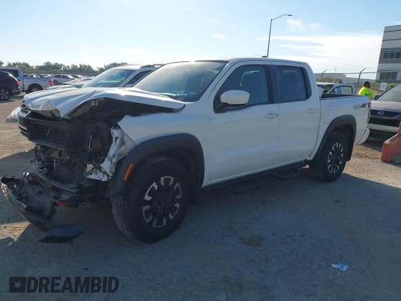 ✅ 2023 Nissan Frontier Pro-4X • VIN: 1N6ED1EKXPN662561 • Lot: 43432334. Listed on IAAI with 73,303 mi. Free auction sales archive from the USA and detailed vehicle history report at DreamBid. Image 2.