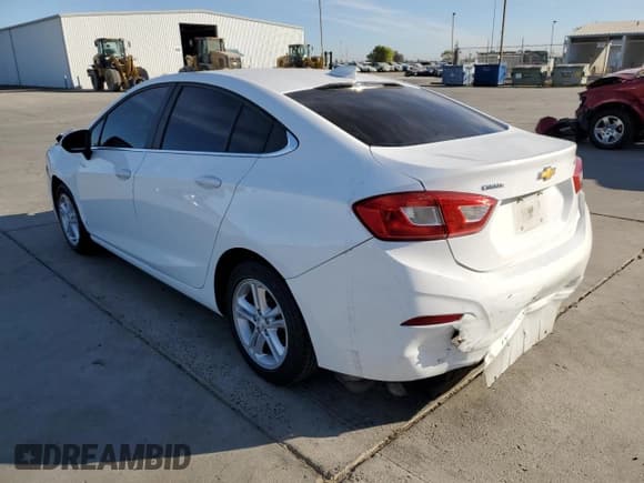 ✅ 2018 Chevrolet Cruze LT • VIN: 1G1BE5SM3J7199215 • Lot: 64859662. Listed on Copart with 113,424 mi. Free auction sales archive from the USA and detailed vehicle history report at DreamBid. Image 3.