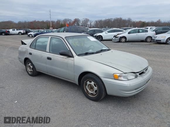 ✅ 1999 Toyota Corolla VE • VIN: 2T1BR12E1XC128924 • Lot: 43671058. Listed on IAAI with 270,679 mi. Free auction sales archive from the USA and detailed vehicle history report at DreamBid. Image 1.