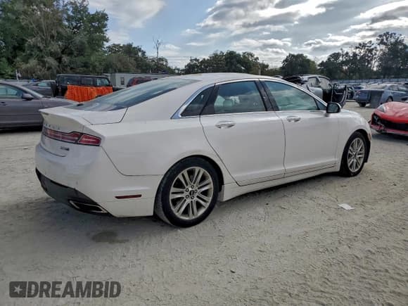✅ 2016 Lincoln MKZ • VIN: 3LN6L2J90GR630133 • Lot: 94142215. Wystawiony na Copart z przebiegiem 69 572 mil. Bezpłatny archiwum sprzedaży aukcyjnych z USA i szczegółowy raport historii pojazdu na DreamBid. Zdjęcie 3.