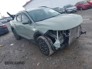2023 Hyundai Santa Cruz SEL Premium с VIN 5NTJDDAF8PH057158, выставлен на аукционе IAAI как лот 43297490 с пробегом 22 330 миль миль и . История ставок и продаж доступна на DreamBid. Изображение 1.