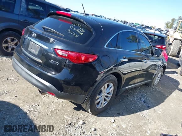 ✅ 2016 Infiniti QX70 • VIN: JN8CS1MW9GM752735 • Lot: 41271197. Listed on IAAI with 165,269 mi. Free auction sales archive from the USA and detailed vehicle history report at DreamBid. Image 4.