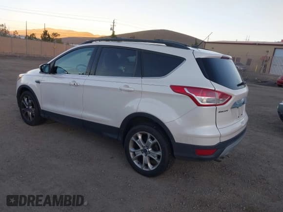 ✅ 2013 Ford Escape SEL • VIN: 1FMCU0HX8DUD85112 • Lot: 43788048. Listed on IAAI with 156,901 mi. Free auction sales archive from the USA and detailed vehicle history report at DreamBid. Image 3.