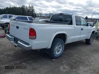 ✅ 1997 Dodge Dakota • VIN: 1B7GG23X5VS242535 • Lot: 41608146. Wystawiony na IAAI z przebiegiem 125 189 mil. Bezpłatny archiwum sprzedaży aukcyjnych z USA i szczegółowy raport historii pojazdu na DreamBid. Zdjęcie 4.
