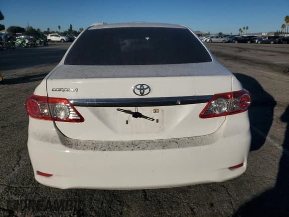 ✅ 2013 Toyota Corolla L • VIN: 5YFBU4EE0DP205354 • Lot: 92176175. Listed on Copart with 131,743 mi. Free auction sales archive from the USA and detailed vehicle history report at DreamBid. Image 6.