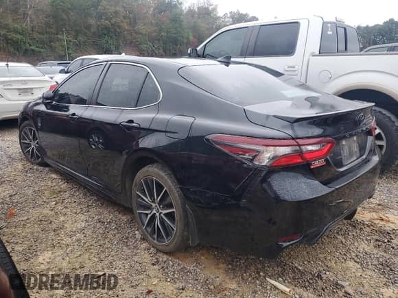 2023 Toyota Camry SE с VIN 4T1G11AK2PU753707, выставлен на аукционе Copart как лот 85533065 с пробегом 79 568 миль миль и Чистый • Clean title. История ставок и продаж доступна на DreamBid. Изображение 2.