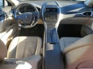 ✅ 2016 Lincoln MKZ • VIN: 3LN6L2JKXGR631793 • Lot: 84890595. Wystawiony na Copart z przebiegiem 80 881 mil. Bezpłatny archiwum sprzedaży aukcyjnych z USA i szczegółowy raport historii pojazdu na DreamBid. Zdjęcie 8.