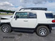 ✅ 2014 Toyota FJ Cruiser • VIN: JTEBU4BF5EK206623 • Lot: 41089477. Wystawiony na IAAI z przebiegiem 54 449 mil. Bezpłatny archiwum sprzedaży aukcyjnych z USA i szczegółowy raport historii pojazdu na DreamBid. Zdjęcie 14.