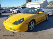 ✅ 2001 Porsche Boxster • VIN: WP0CA29861U624541 • Lot: 43911862. Listed on IAAI with 91,851 mi. Free auction sales archive from the USA and detailed vehicle history report at DreamBid. Image 2.