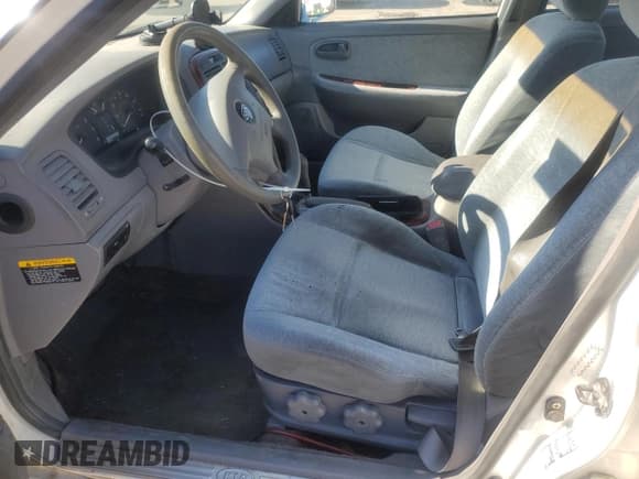 ✅ 2003 Kia Optima LX • VIN: KNAGD128X35205020 • Лот: 76521374. Опубликован ранее на Copart с пробегом 242 323 миль. Бесплатный доступ к архиву аукционных продаж из США и подробный отчёт об истории автомобиля на DreamBid. Изображение 7.