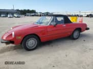 ✅ 1978 Alfa Romeo Spider • VIN: AR115410004279 • Lot: 81097265. Listed on Copart with 10,821 mi. Free auction sales archive from the USA and detailed vehicle history report at DreamBid. Image 1.